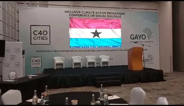 C40 Cities and GAYO conference stage with screen and lectern