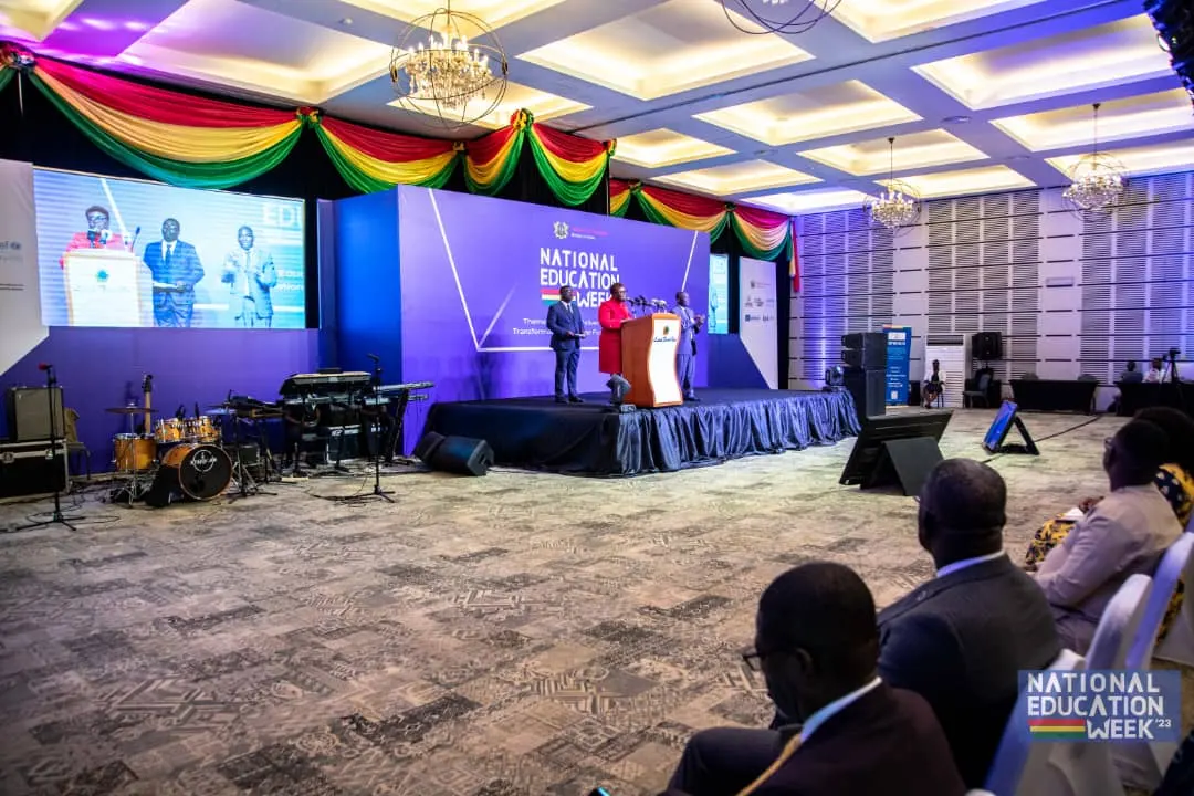 Speakers at the National Education Week podium and stage